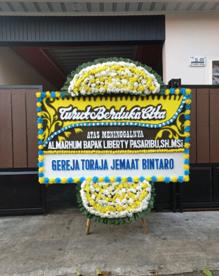 Papan Bunga Duka di Sebuku